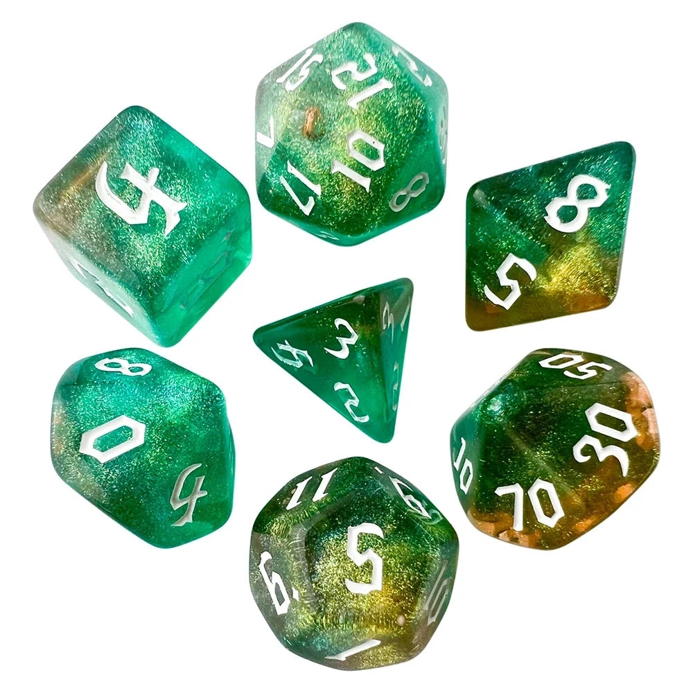 Set of green polyhedral dice with white numbers on a white background